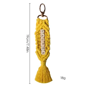 Bohemian handmade yellow macrame keychain with wooden beads and tassel detail
