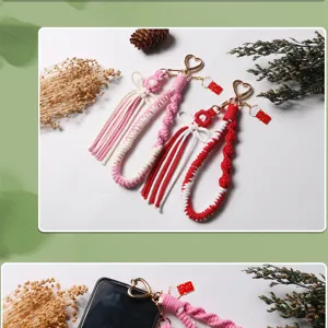 Handmade woven cotton rope keychains with bow and flower charms for bags
