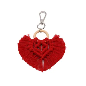 Handmade red macramé heart keychain with wooden ring and tassel pendant for bag decoration