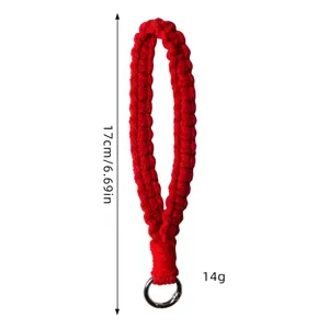 Hand-woven red wrist strap lanyard phone charm with metal ring key chain accessory.