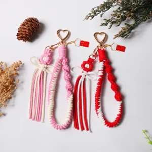 Creative handmade braided cotton rope flower and bow keychains with golden heart clasps
