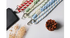Handmade woven phone lanyard with cute floral design, adjustable cross body strap and metal hooks.