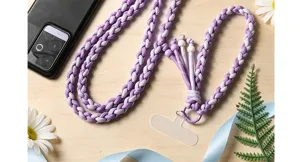 Close-up detail of purple hand-woven braided cotton rope phone lanyard with beads