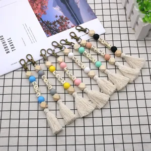 Macaron farbener Holzperlen Schlüsselanhänger mit MAMA Buchstaben und Boho Quasten