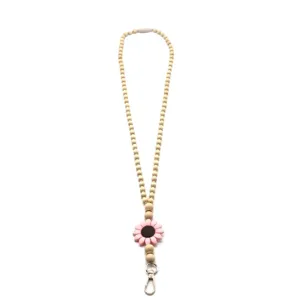 Handmade wooden bead lanyard featuring a pink silicone flower for ID badges and keychains