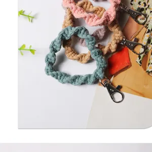 Detail macro view of colorful hand-woven cotton macramé phone wrist straps with metal clasps