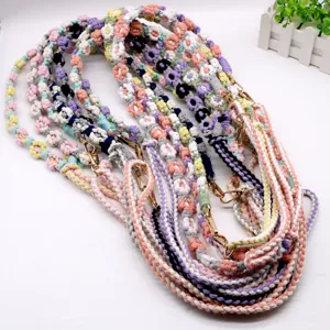 Handmade woven cotton shoulder strap with colorful flower pattern and golden clips