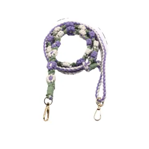 Hand-woven cotton shoulder strap with colorful floral patterns and metal clasps