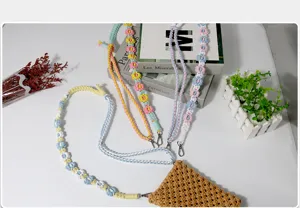 Handmade macrame daisy flower phone lanyard and bag strap with bohemian woven details