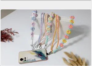 Bohemian braided daisy flower phone lanyard strap with metal clips for bags and keys.