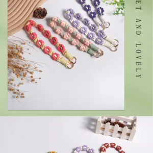 Hand-woven macramé daisy straps for bags and keychains in multiple pastel colors