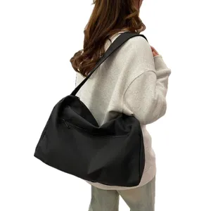 Bolsa de deporte negra de gran capacidad y bolsa de viaje con correa ajustable