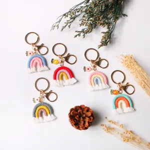 Handmade crochet rainbow tassel keychains with cute flower charms in five colors