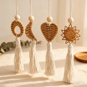 Handmade Bohemian rattan woven wall hangings with cotton tassels for home decor