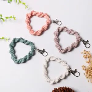 Handmade cotton woven heart shaped phone wristlet strap keychain in four pastel colors
