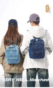 Back view of two people wearing light and dark blue washed denim small backpacks