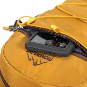 Detail of outdoor backpack zipper pocket with a smartphone inside