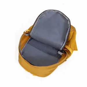 Interior detail view of a lightweight large capacity mustard yellow outdoor backpack