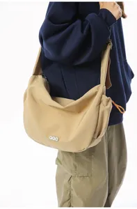 Minimalist khaki crescent dumpling crossbody bag for casual daily travel and work