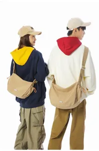 Models wearing khaki large capacity crossbody dumpling bags for a trendy casual look