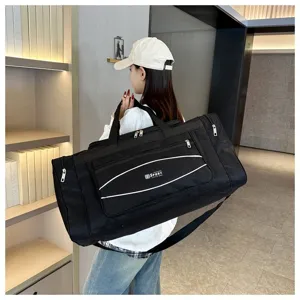 Grand sac de voyage noir grand format pour le sport, le fitness et les voyages d'affaires.