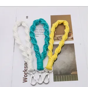Handmade braided wrist lanyard keychain with metal clasp, portable woven key accessories.