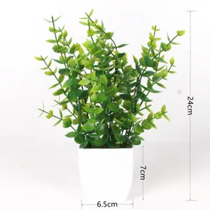 Artificial eucalyptus plant detail view, plastic potted green plant, measuring 24cm tall.