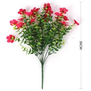 Close-up view of the 36cm tall artificial red flower bouquet with lush green foliage