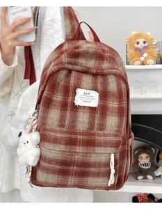 Retro plaid backpack for women, Japanese style autumn winter casual school bookbag with cute charm.