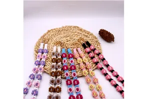 Handmade Bohemian braided daisy flower phone lanyard straps in various vibrant colors
