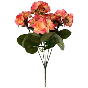 Detailed view of pink and yellow artificial geranium flowers with realistic green leaves