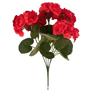 Detailed macro view of realistic red artificial geranium flowers for home decoration