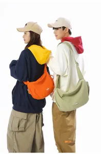 Professional shot of stylish large capacity crossbody dumpling bags for casual travel use