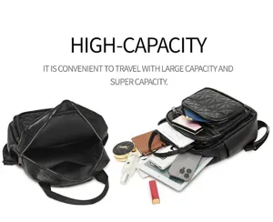 Sac à dos matelassé en cuir PU noir avec grande capacité et multiples poches zippées.