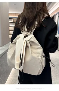 Casual large capacity nylon backpack for women, lightweight commuter school daypack and travel bag.