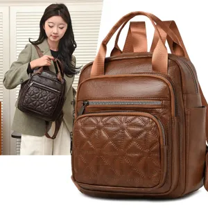 Sac à dos élégant en cuir PU marron pour femme, sac de voyage matelassé et décontracté quotidien.