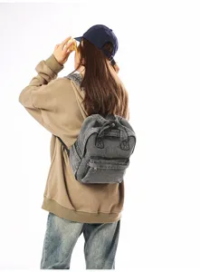 Vintage washed denim mini backpack for women in grey Mori style, perfect for casual travel