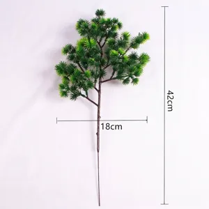 Artificial pine branch detail with 42cm height and 18cm width dimensions