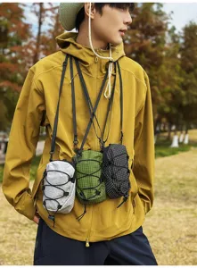 Outdoor tactische mini-crossbodytassen voor telefoons in de kleuren grijs groen en zwart.