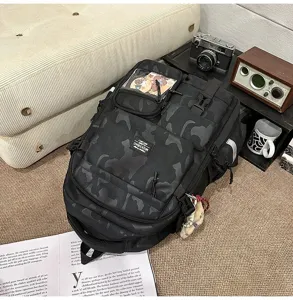 Casual camo student backpack with multi pockets and clear window for daily commute.