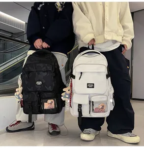 Casual large capacity backpack for students and commuters with multiple pockets.