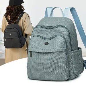 Lightweight minimalist backpack for travel and daily commute with multiple pockets