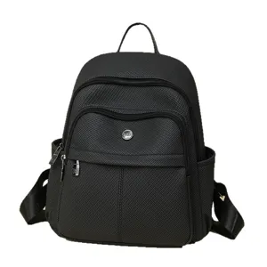 Fashionable black textured multi-pocket travel backpack for school and casual outings