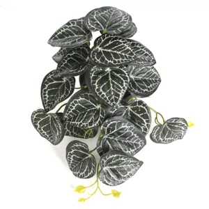 Detailed view of artificial watermelon leaves with 3D printed white vein patterns