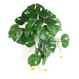 Detailed view of artificial mini Monstera leaves with realistic 3D-printed textures
