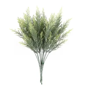 Detailed macro shot of realistic artificial dark green pine needles for festive decor