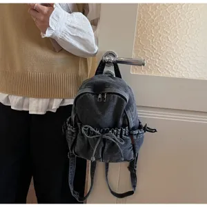 Sac à dos en jean tendance avec lien de serrage, sac quotidien élégant pour femmes.