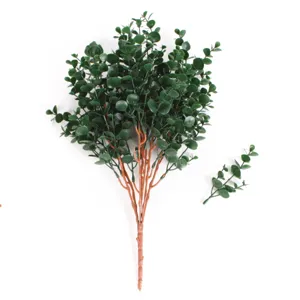 Close-up detail of artificial eucalyptus bunch with green round leaves and brown stems