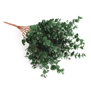Close-up detail showing the realistic green leaves of this artificial eucalyptus bundle
