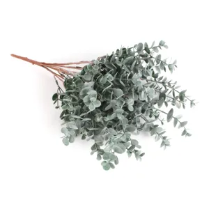Close-up detail of artificial eucalyptus leaves bundle for interior home decoration.